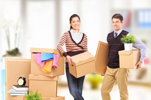 Local movers preparing packed boxes in Mayfair