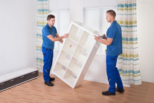 Flat removal service loading items for transport in Mayfair